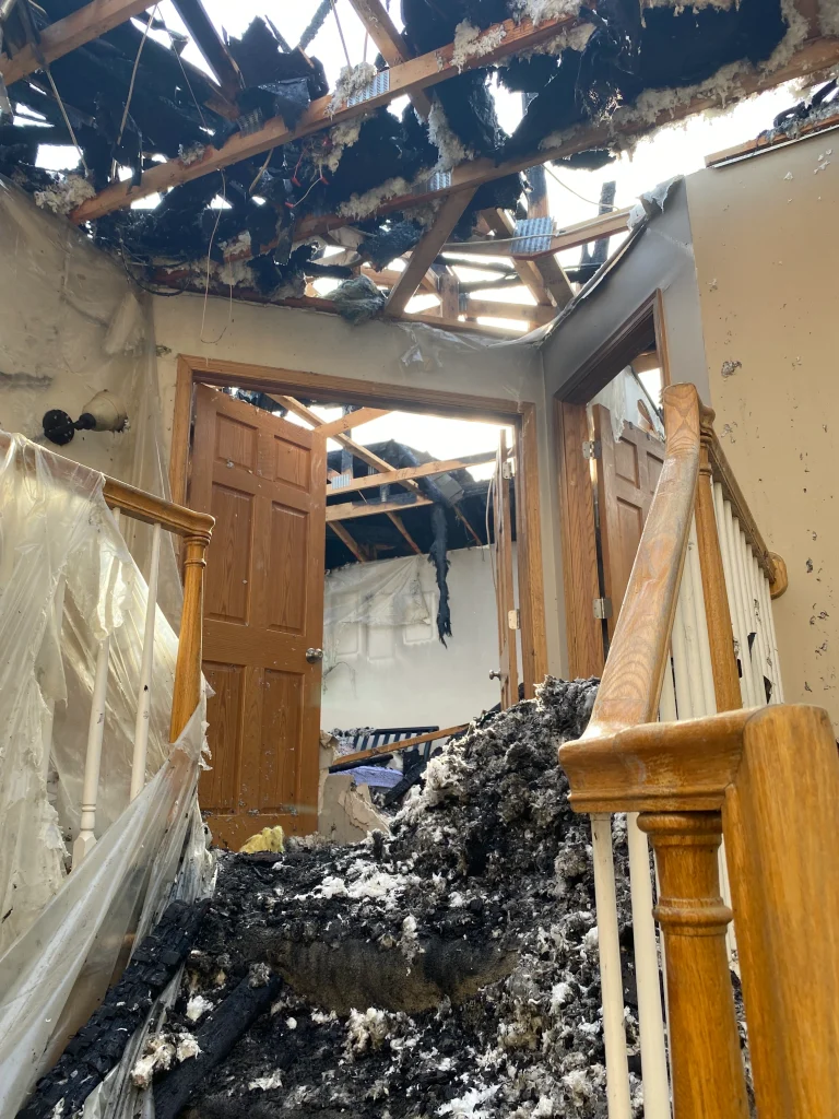 Fire damage to upper floor and roof structure of commercial property