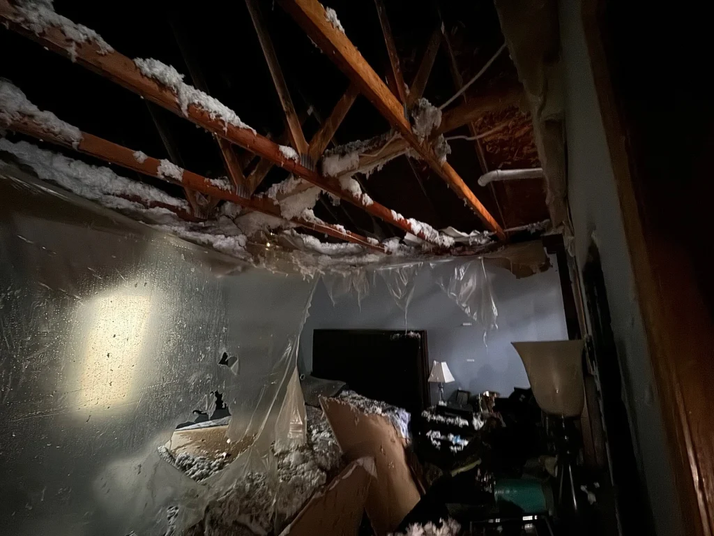 Ceiling collapse from fire damage and fire suppression water at apartment complex